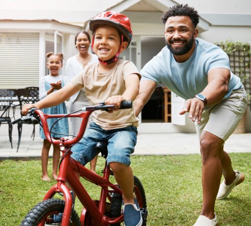 Learning to ride a bike in the backyard Rent Assistance Benefit